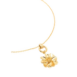 collar flor dorada