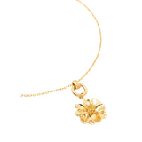 collar flor dorada